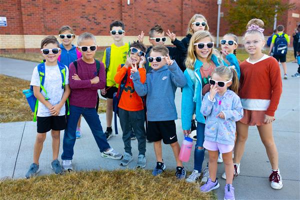 Students walking to school for National Walk to School Day.